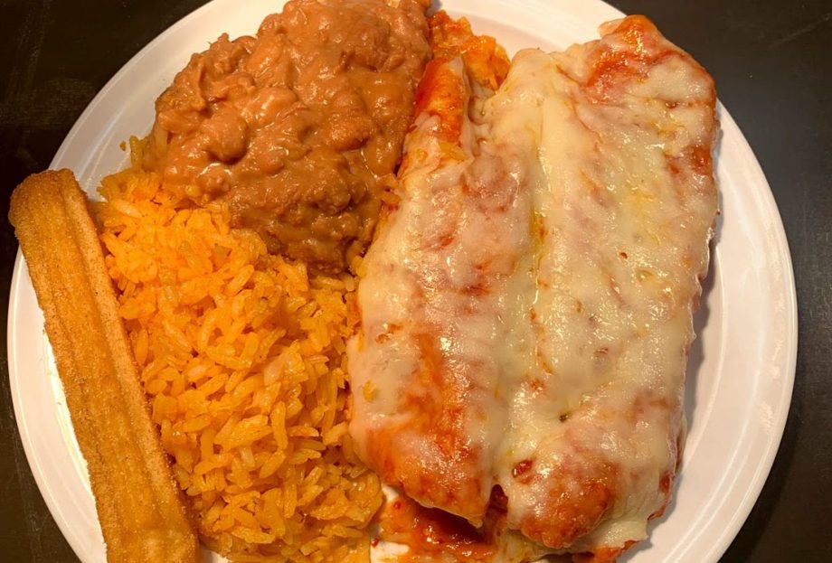 Home cooked red sauce Chicken Enchiladas, Mexican rice, home cooked beans and Mexican churro