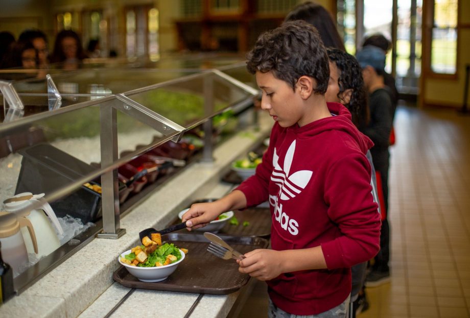 Boys serving lunch at the dining hall