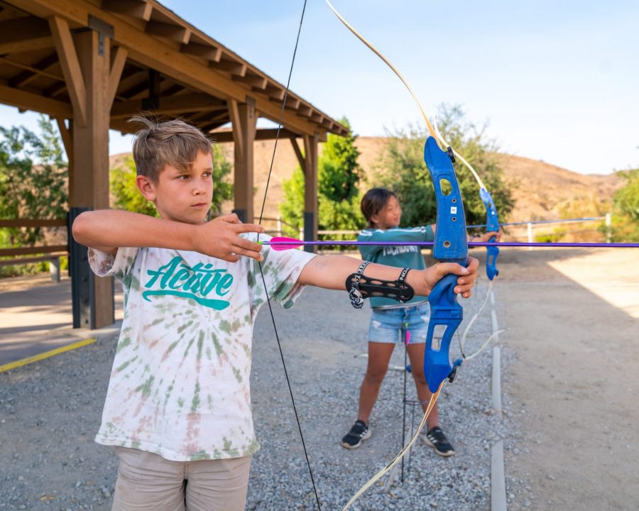 Kids at the archery range practicing their shots