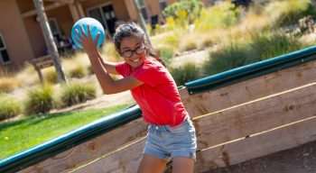 Girl throwing a gaga ball