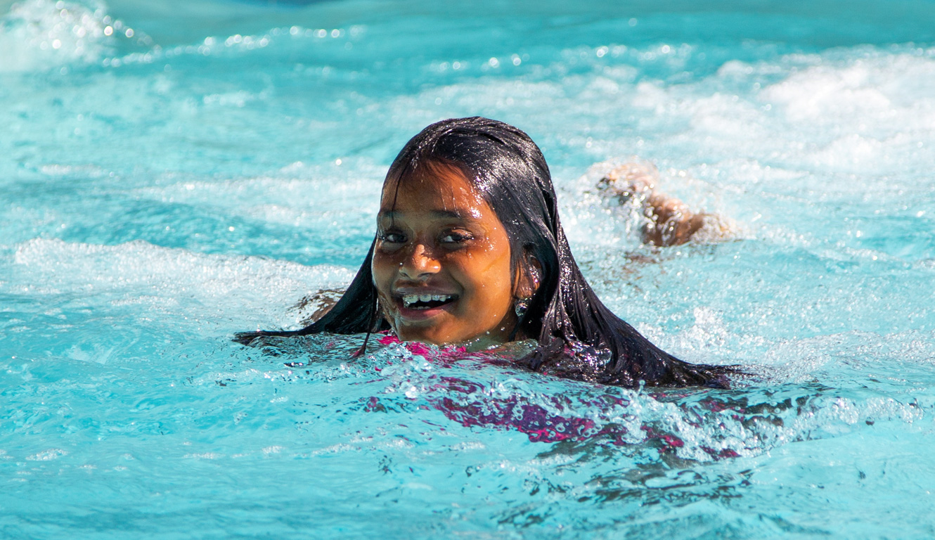 Girl swimming in the pool