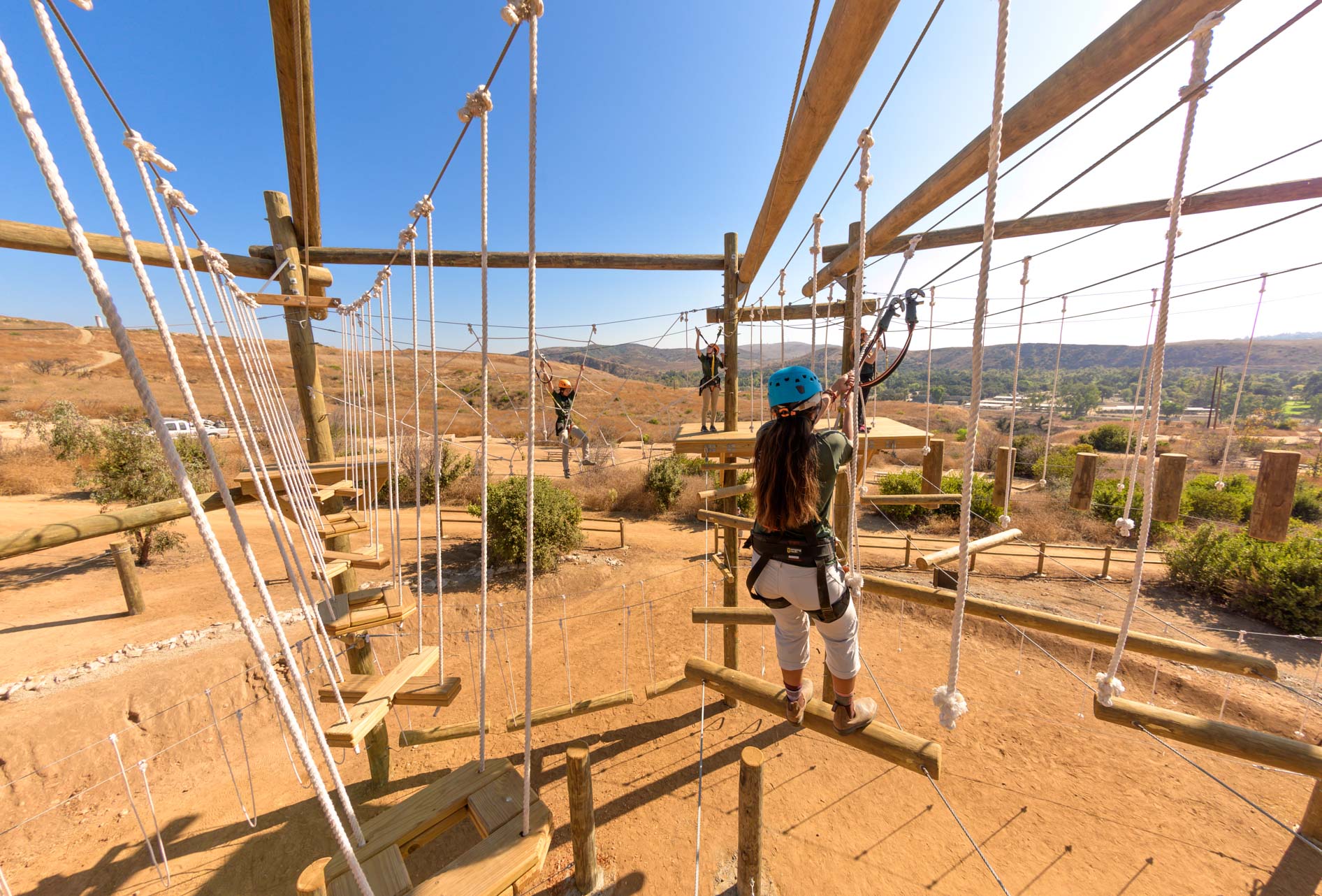 Guest on the high ropes section of the Adventure Hill challenge course