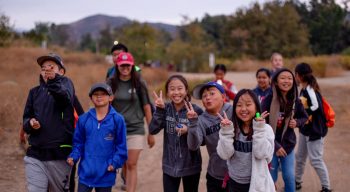 Teens on a night hike during an overnight program